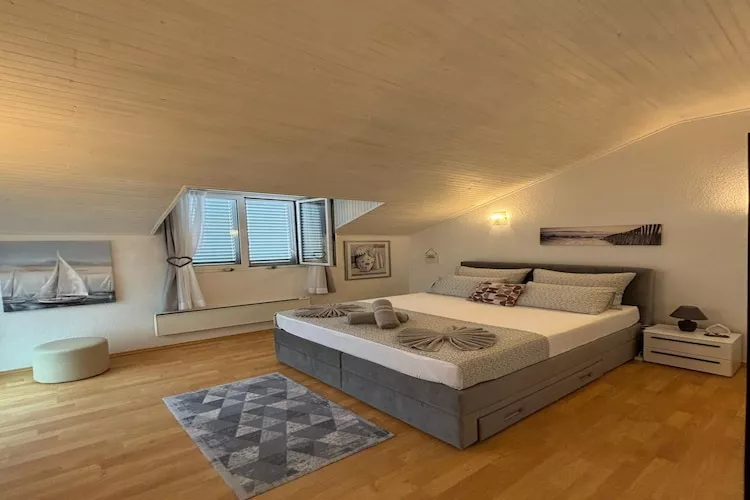 Indy's Beach Apartments -Two Bedroom Apartment with Balcony and Sea View-Bedroom