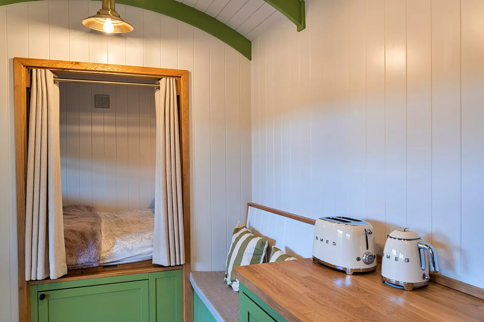 The Shepherd's Hut at Northcombe Farm-Living room
