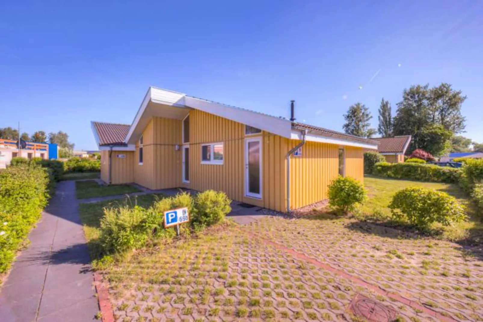 Ferienhaus Seeschwalbe-69a-Außenbereich Sommer