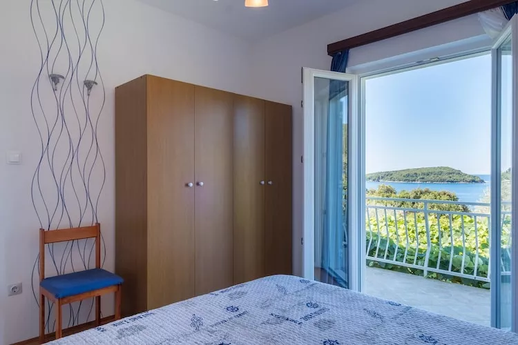 Apartments Saulan - One Bedroom Apartment with Balcony and Sea View (Molunat)-Bedroom