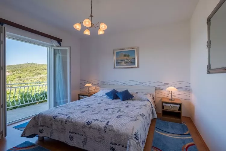 Apartments Saulan - One Bedroom Apartment with Balcony and Sea View (Molunat)-Bedroom
