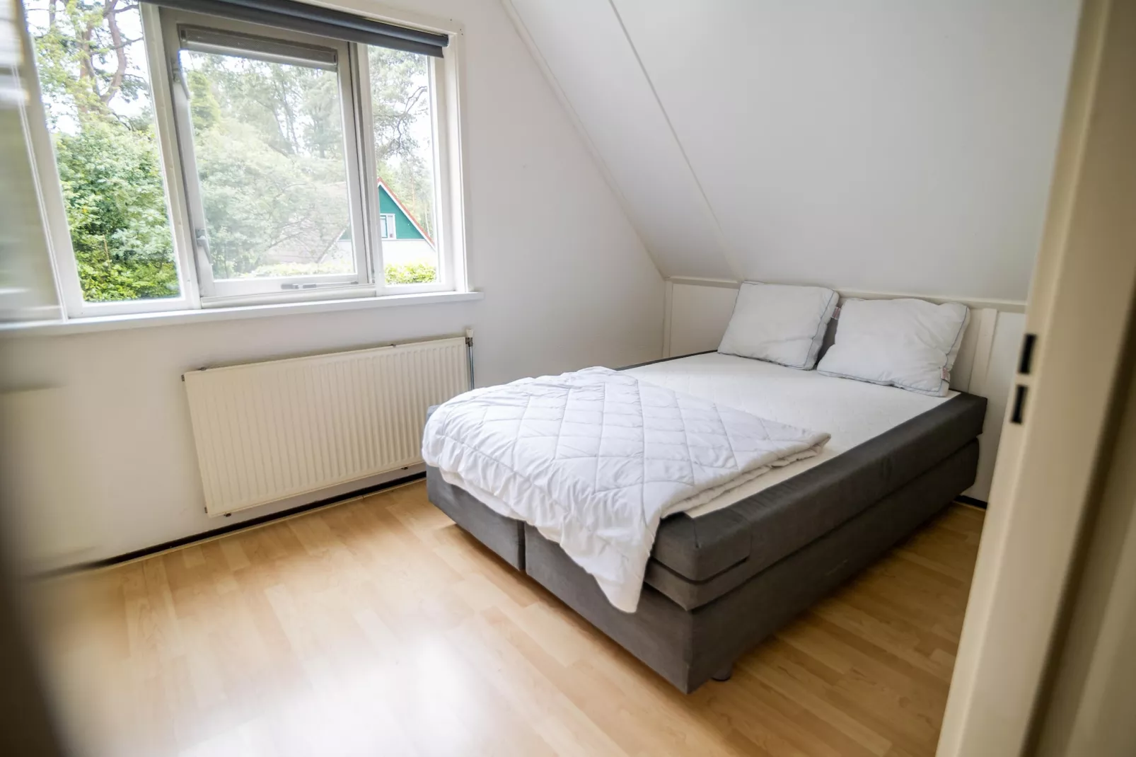 4-persoons stenen bosvilla-Bedroom