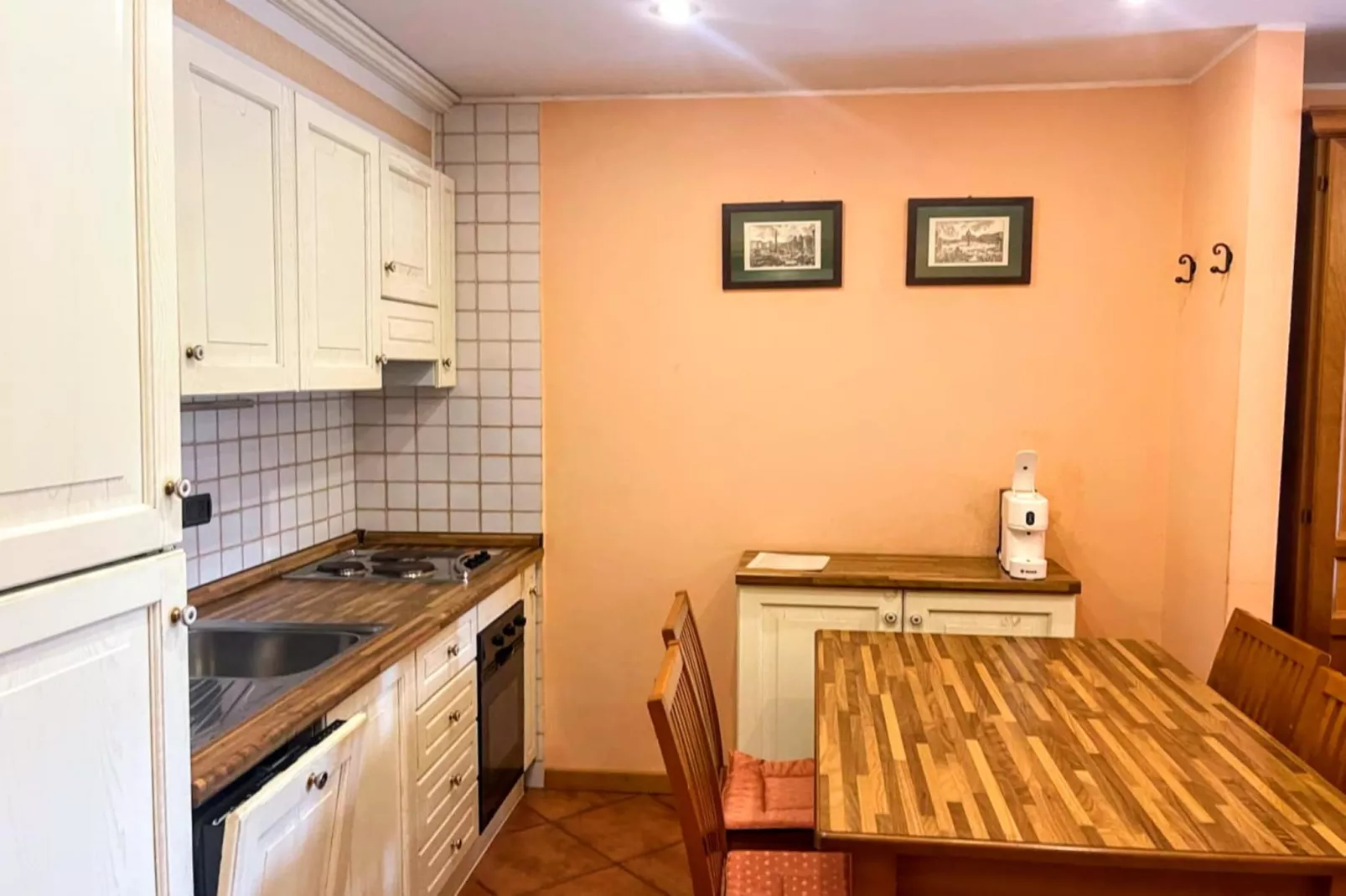 Bilocale vista giardino 105-Kitchen