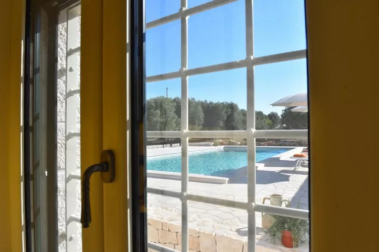 Villa Trulli dell'amore mit beheiztem Pool in Ostuni-Außenbereich Sommer