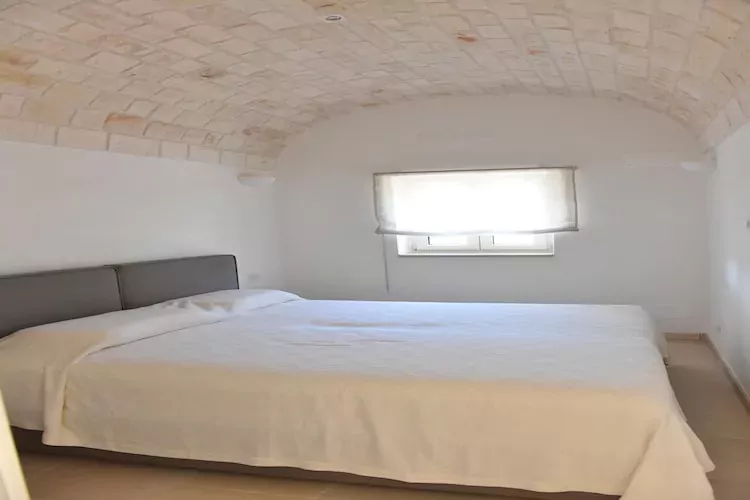 Villa Trulli dell'amore mit beheiztem Pool in Ostuni-Bedroom