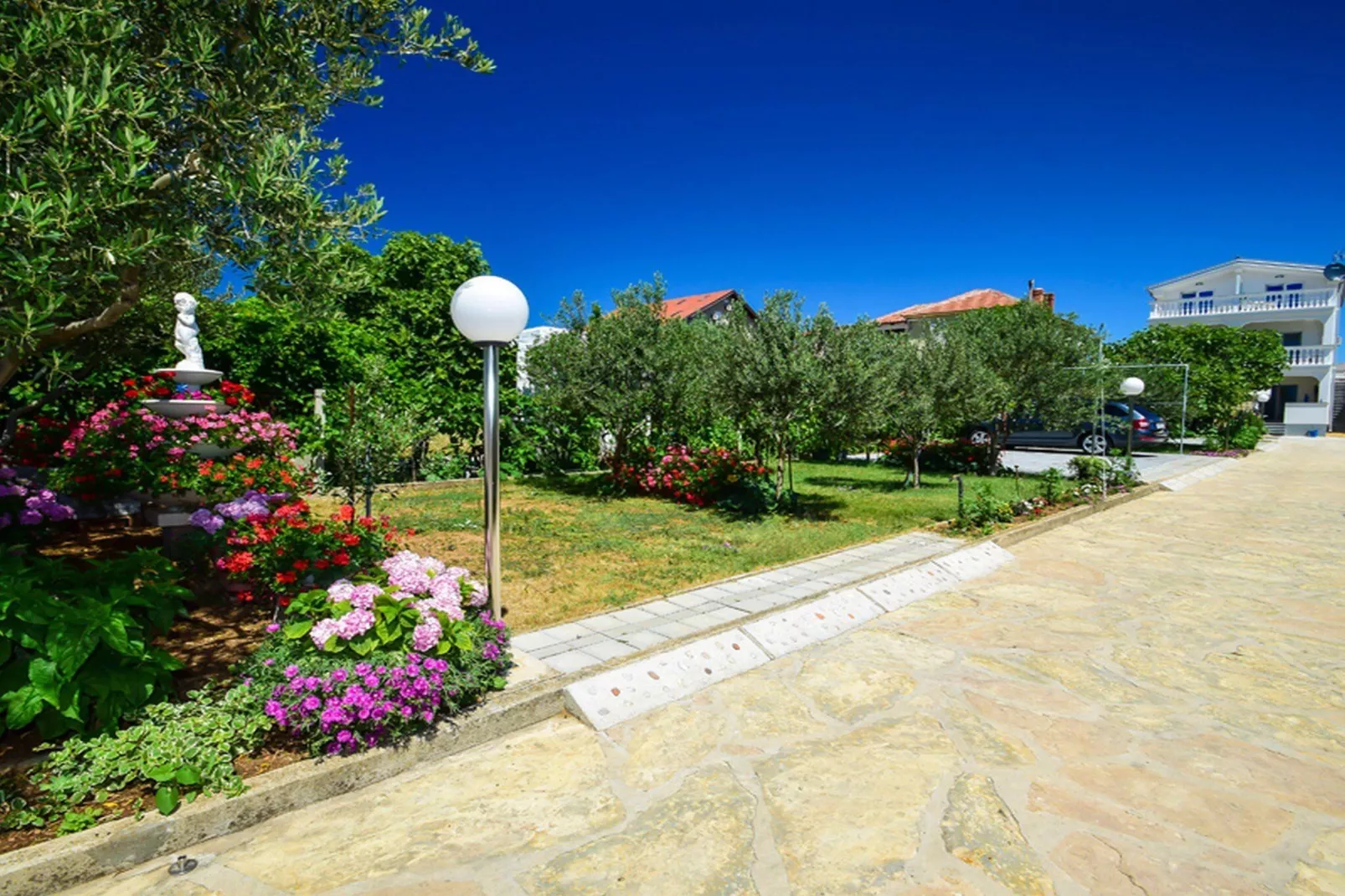 Apartments Olga - one bedroom apartment A1-Gardens summer