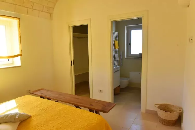 Villa Trulli dell'amore mit beheiztem Pool in Ostuni-Bedroom