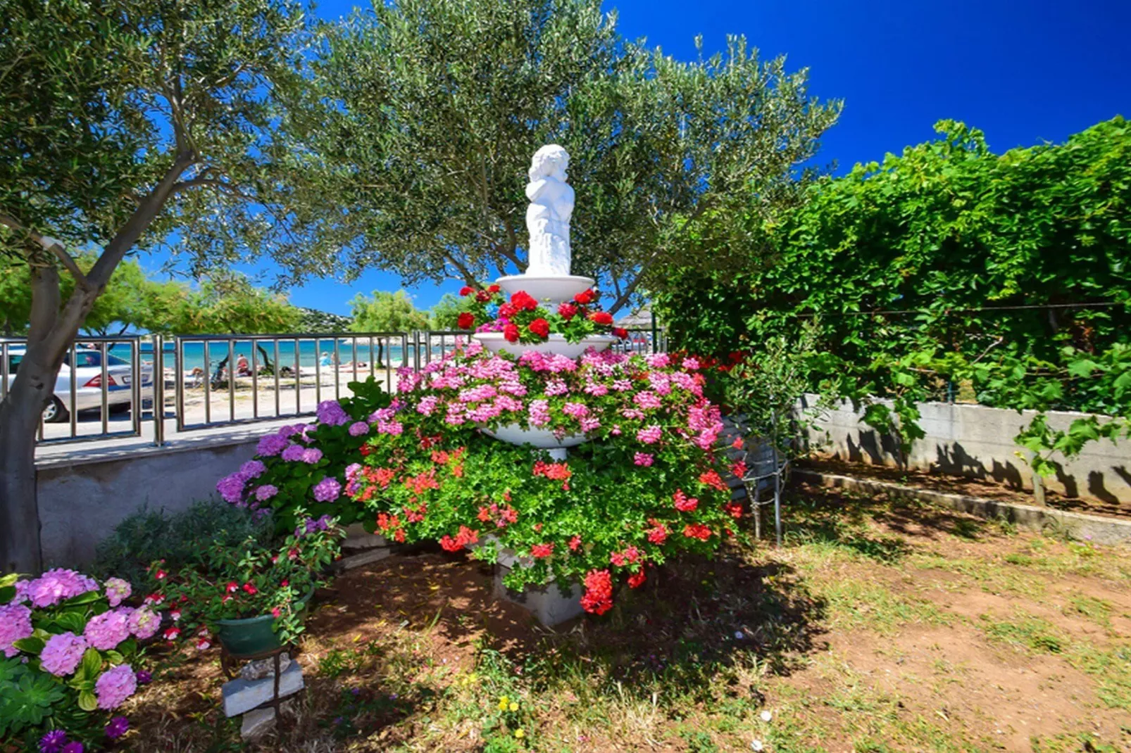 Apartments Olga - one bedroom apartment A1-Gardens summer