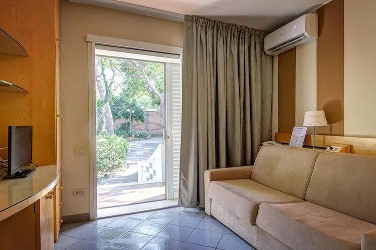 Holiday resort Riva degli Etruschi San Vincenzo-Ville Comfort  Trilo-SANGIOVETO 200 m dal mare-Living room