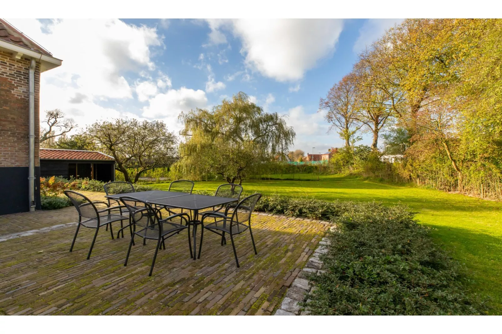 Vakantiehuis 'Boerderij Molenhof' - Stationsweg 5  Heinkenszand-Terrace balcony