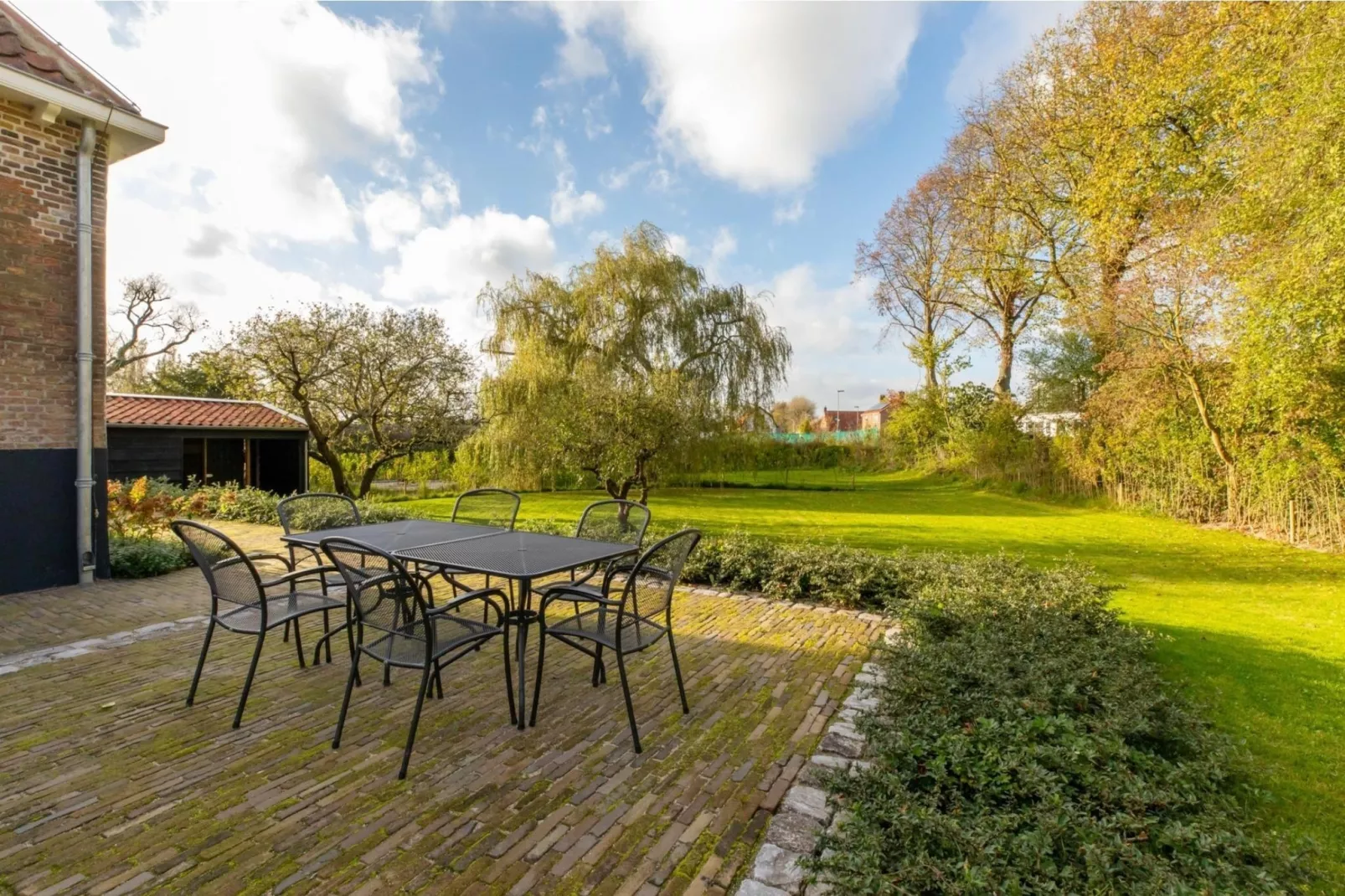 Vakantiehuis 'Boerderij Molenhof' - Stationsweg 5  Heinkenszand-Terrace balcony