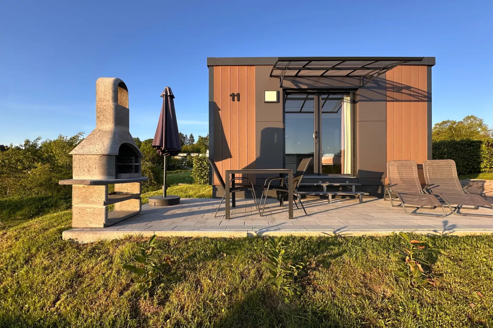 FERIENDORF SEEBLICK - Tiny Chalet am Eixendorfer See-Exterior in summer