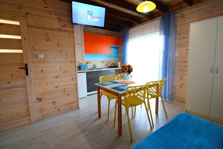 Piętrowe domki wakacyjne z 1 sypialnią w Rewalu-Living room