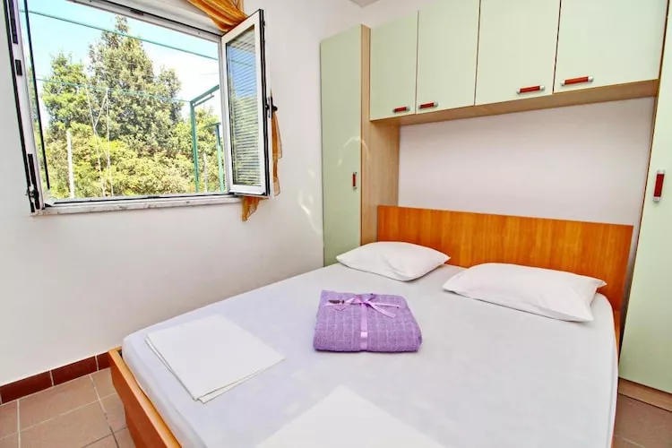 Apartments Neven - Two Bedroom Apartment with Terrace and Partial Sea View (A1)-Bedroom