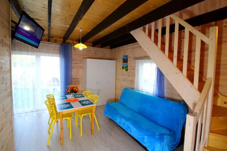 Piętrowe domki wakacyjne z 1 sypialnią w Rewalu-Living room