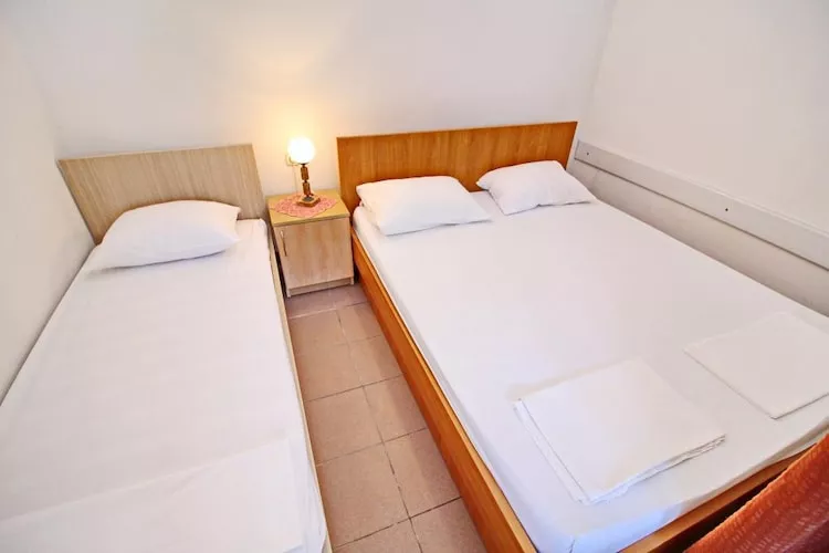 Apartments Neven - Studio Apartment with Terrace and Partial Sea View (A3)-Bedroom