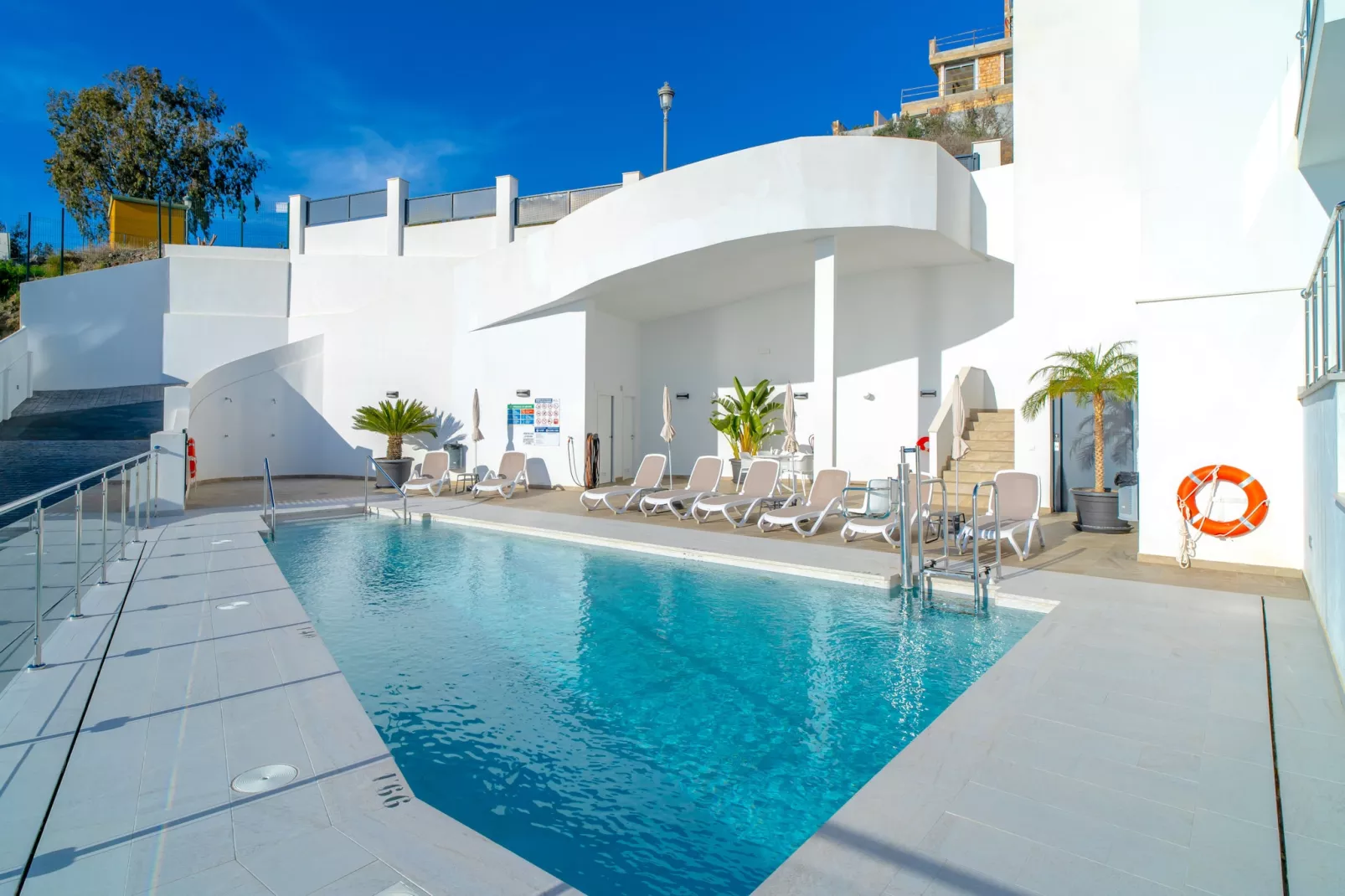 Terrazas de Ladera Duplex 7 by Casasol-Exterior in summer