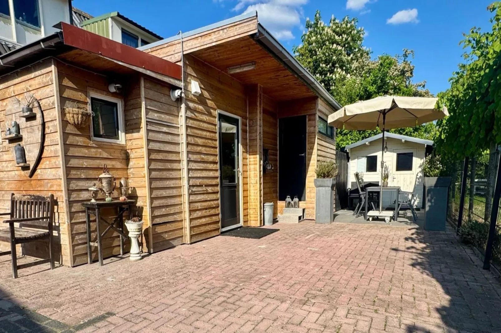 Okken House 1 and 3A-Exterior in summer