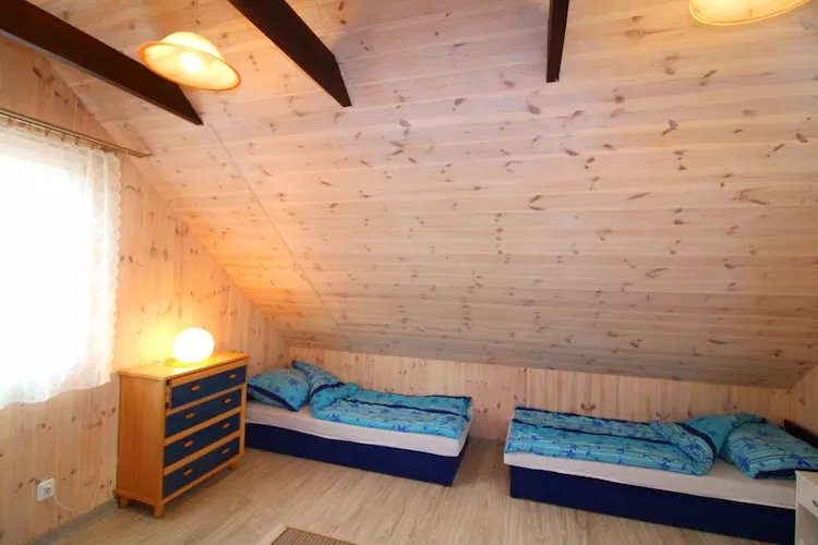 Piętrowe domki wakacyjne z 1 sypialnią w Rewalu-Bedroom