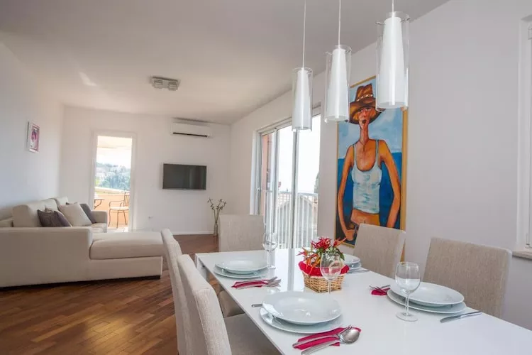 Apartments Nina - Two-Bedroom Apartment with Balcony and Sea View (Orašac)-Dining room