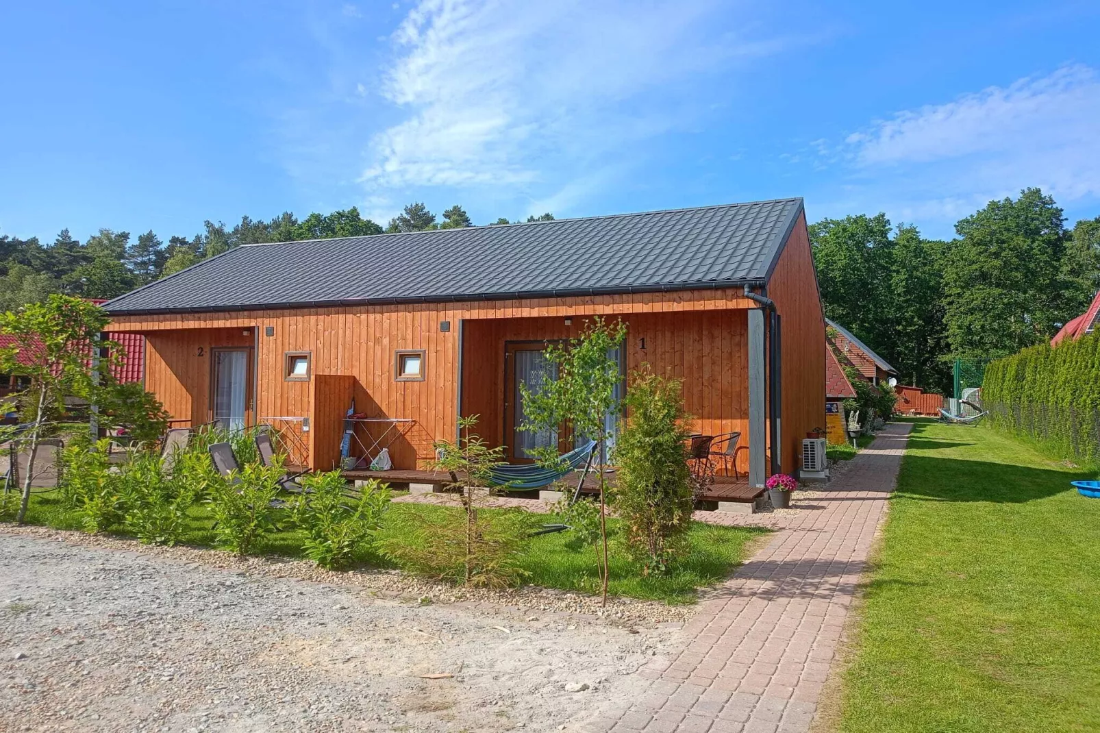 Bliźniacze domki parterowe Jarosławiec-Exterior in summer