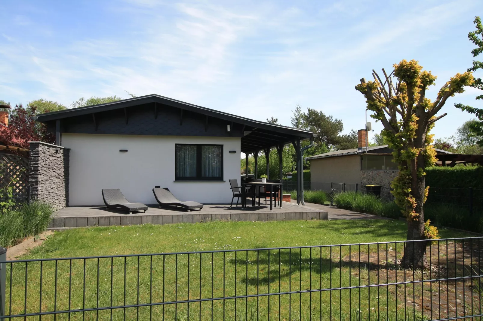 Ferienhaus mit Wasserblick 3 Pers-Exterior in summer