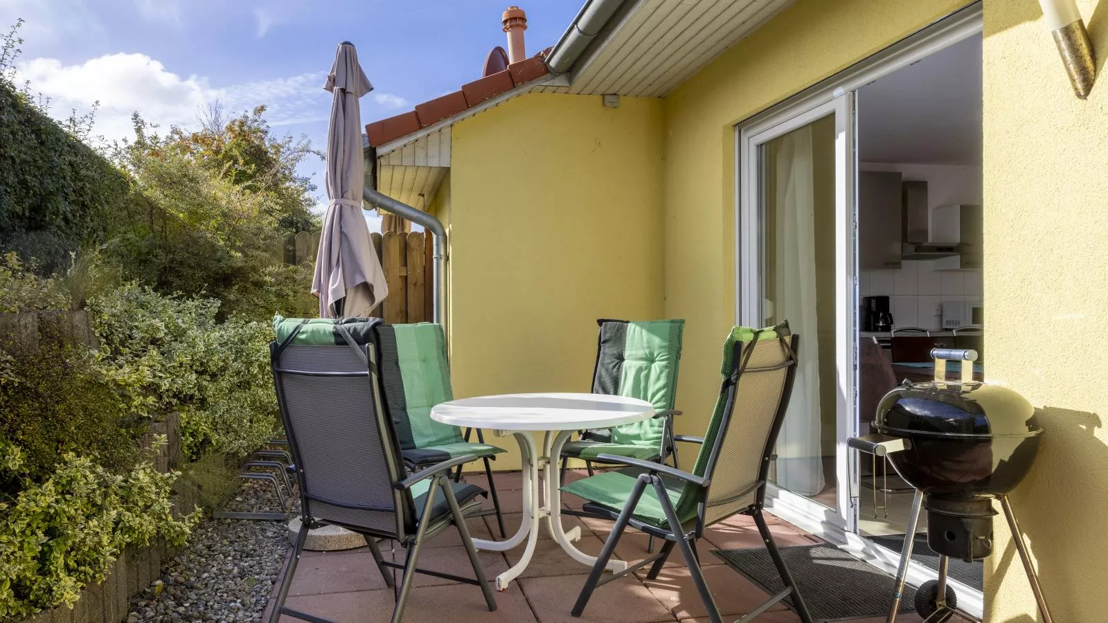 Windflüchter links mit Sauna-Terrasse/Balkon