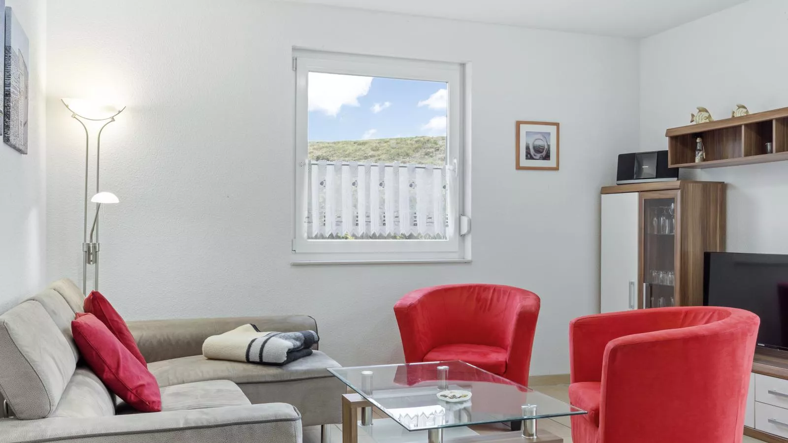 Stranddistel links mit Sauna-Wohnzimmer