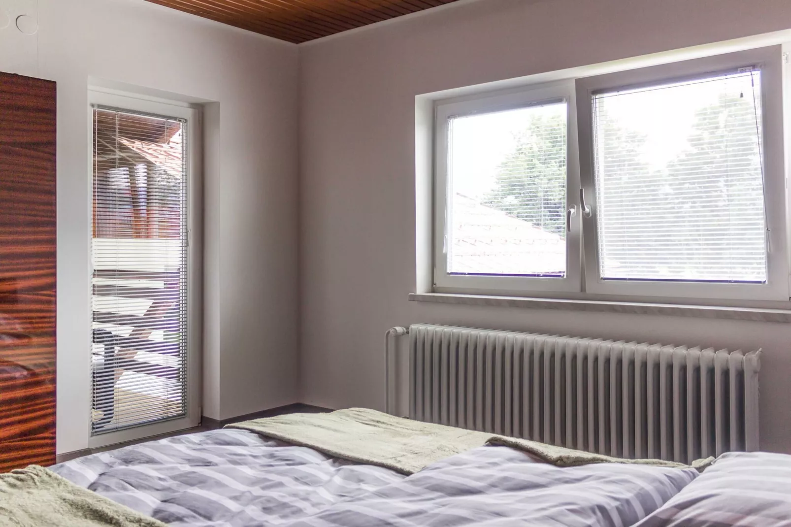 Cozy Holiday Home with Garden, BBQ, and Outdoor Dining Area in Rečica ob Savinji - Two Bedroom Apartment-Schlafzimmer