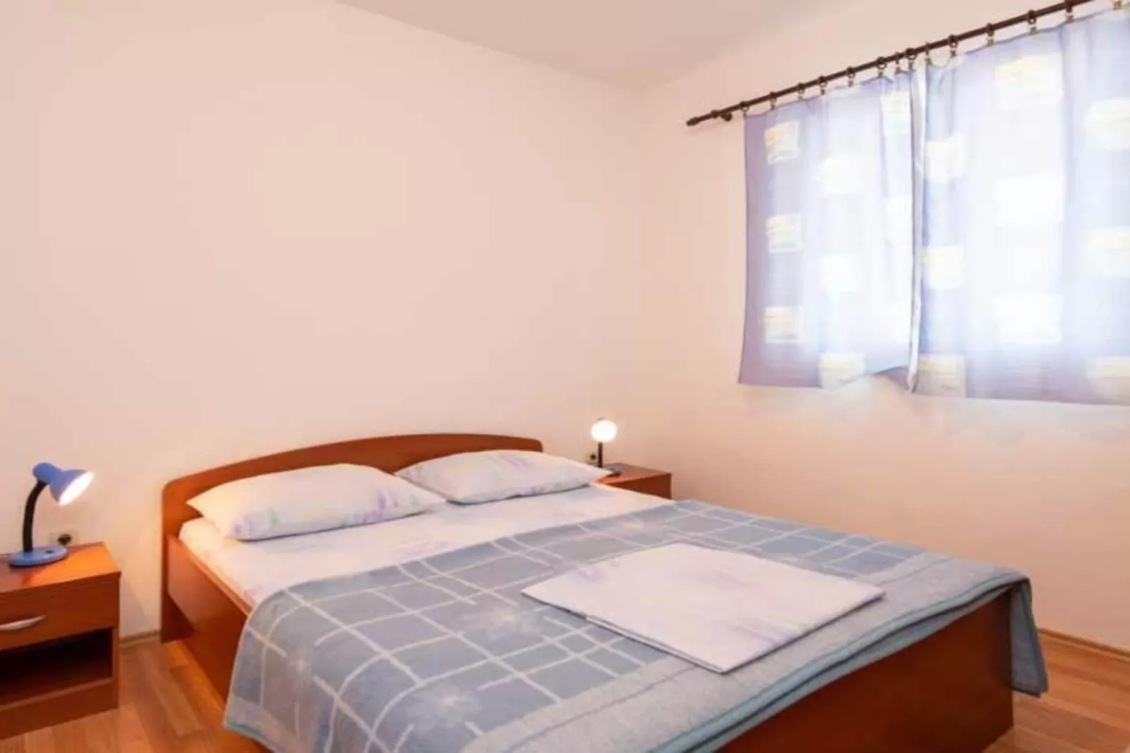 Spacious and Cozy Seafront Apartments - Two Bedroom Apartment  with Terrace and Sea View-Bedroom