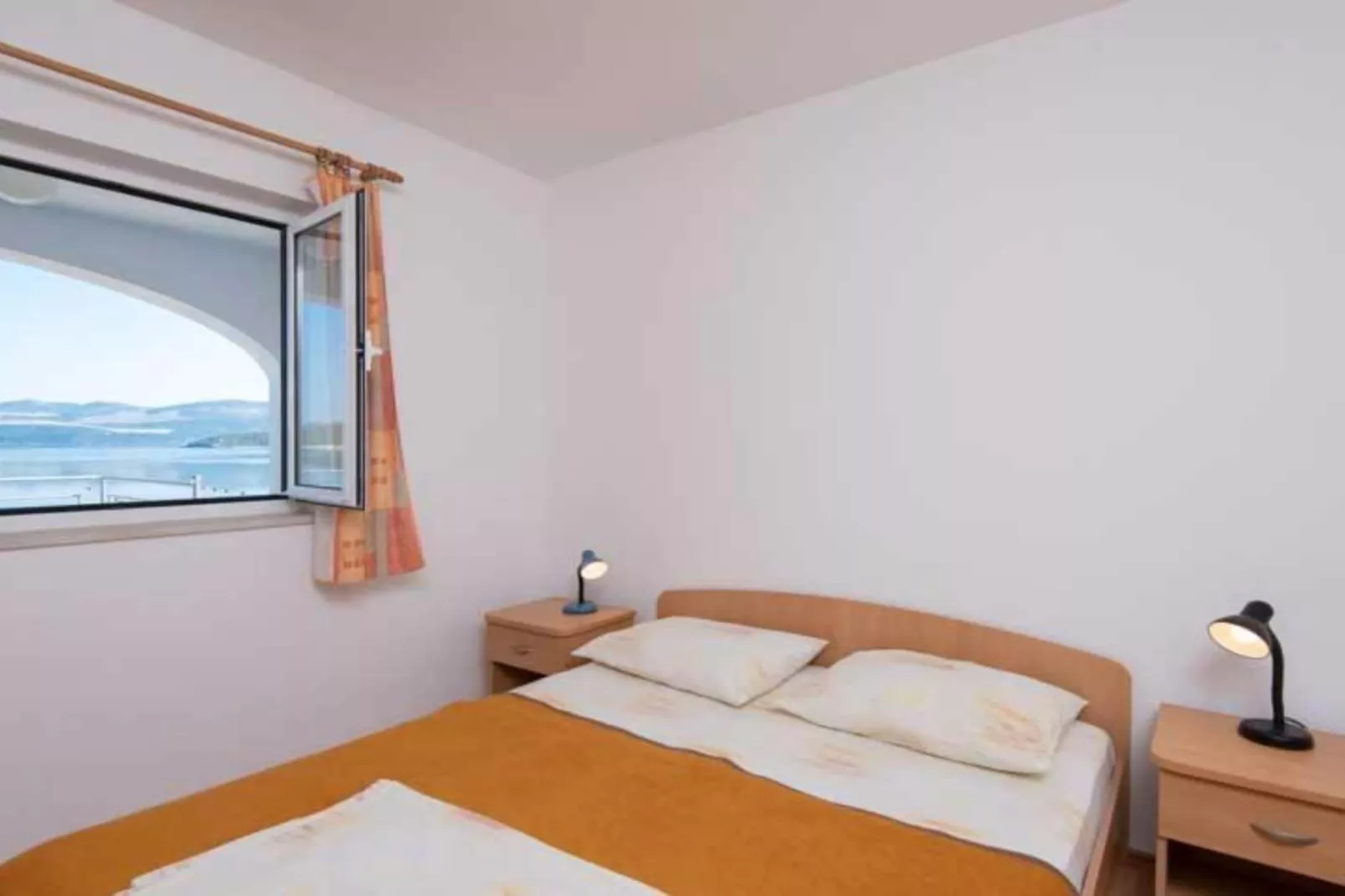 Spacious and Cozy Seafront Apartments - One Bedroom Apartment with Terrace and Sea View-Bedroom
