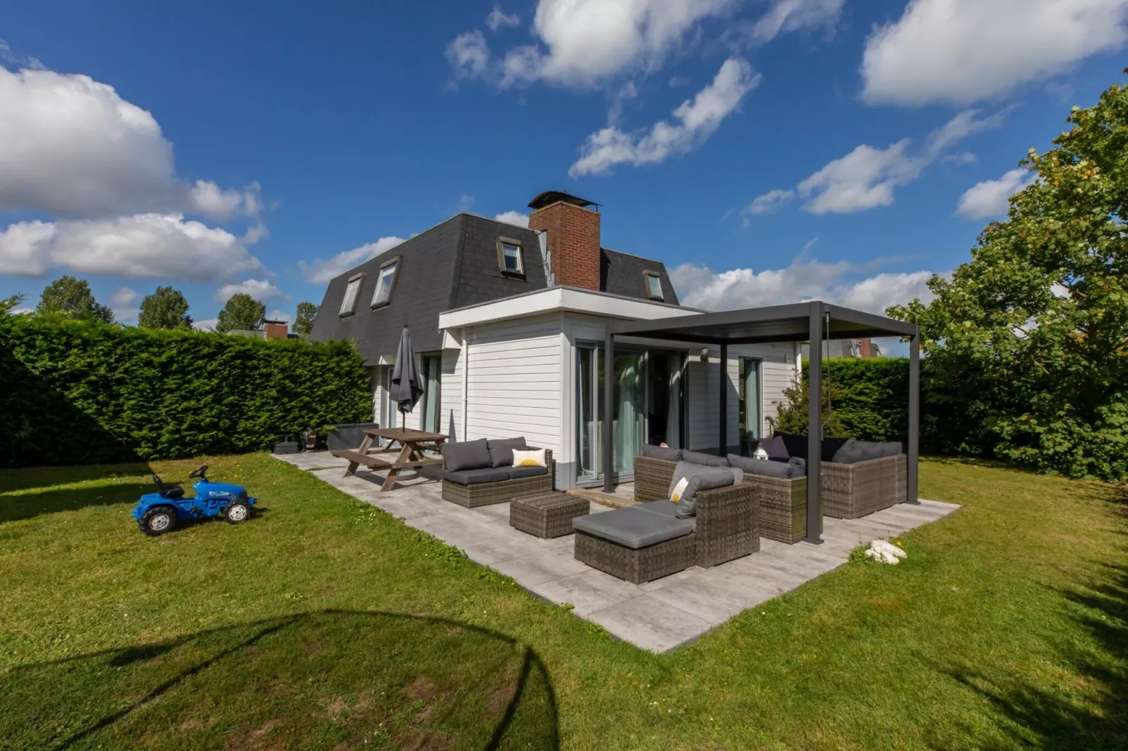 Strandhuis Schoneveld-Jardins en été