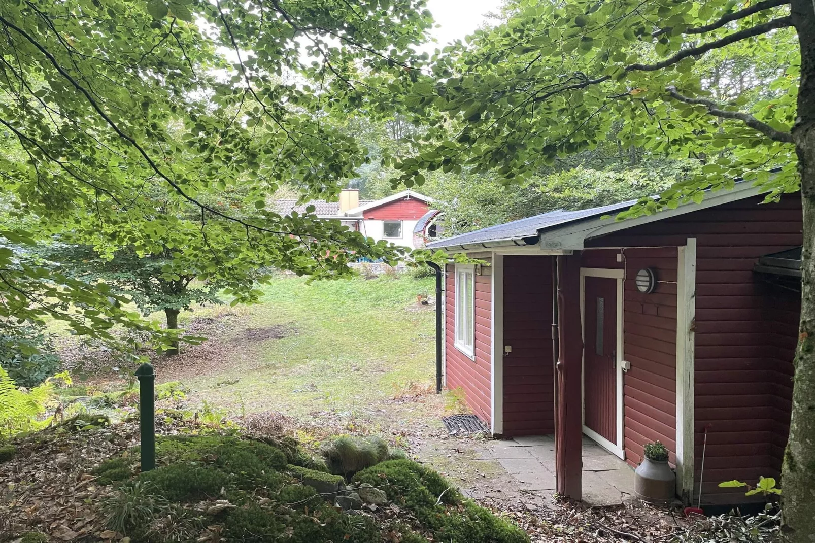 Charmant chalet au bord du lac avec sauna-Extérieur