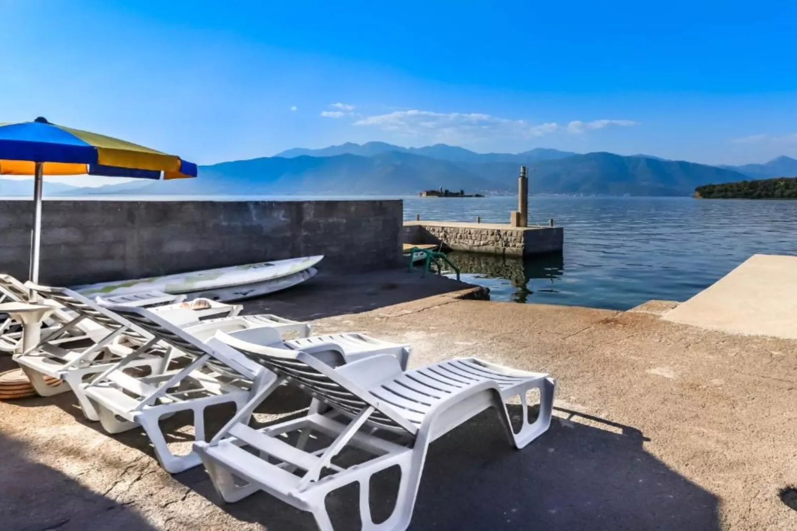 Beachfront Escape – Steps from the Crystal-Clear Sea - One Bedroom Apartment 1-Ambiance