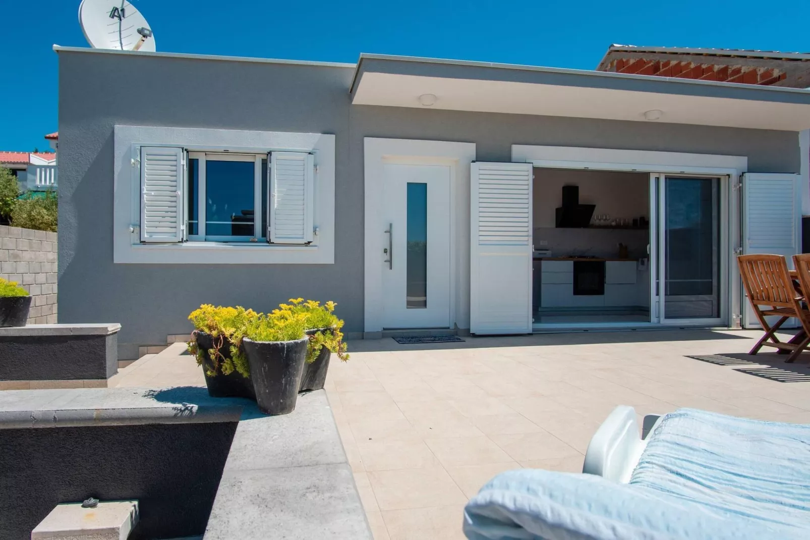 Beach house Festini-Exterior in summer