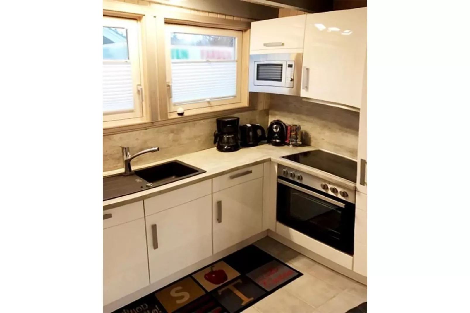 FH Wildgans Comfort mit Sauna & Kaminofen 81 qm 77-Küche