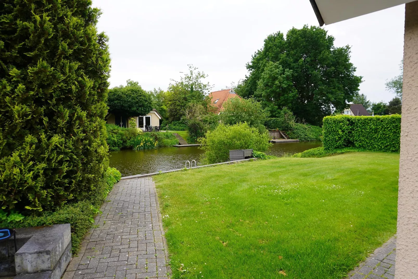6 pers. Vosseberghuis Prestige met buitenspa-Gardens in summer