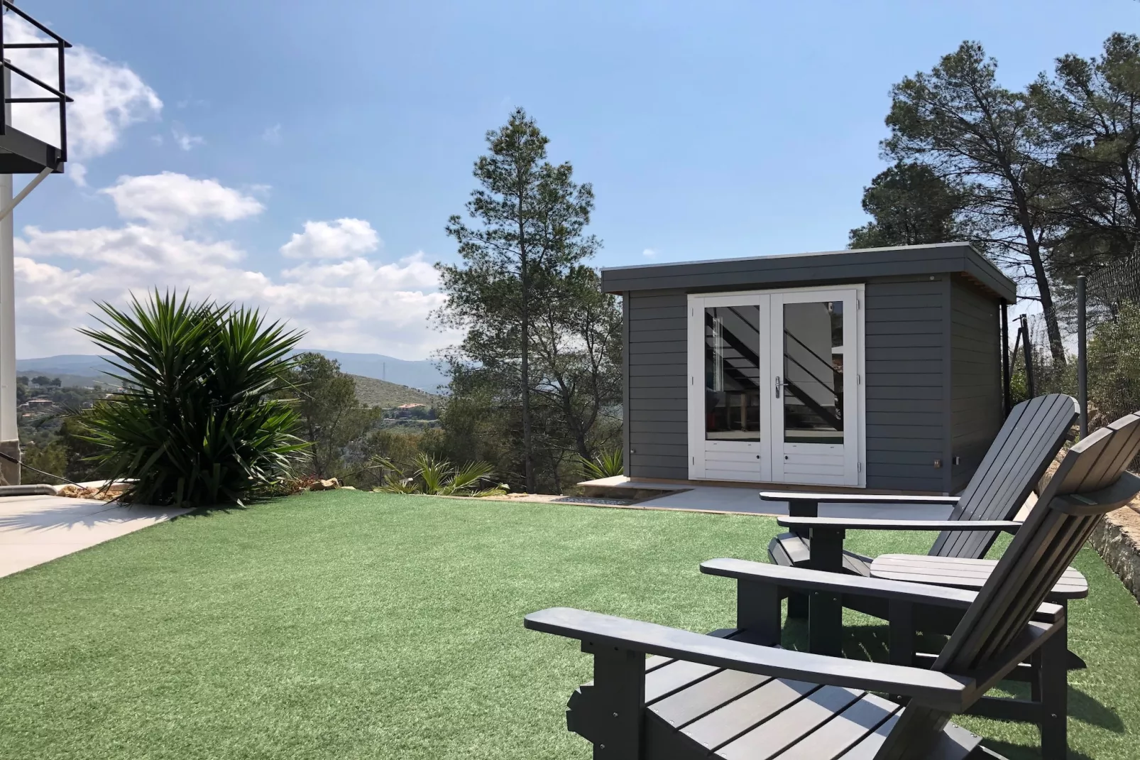 House Olivella-Gardens in summer