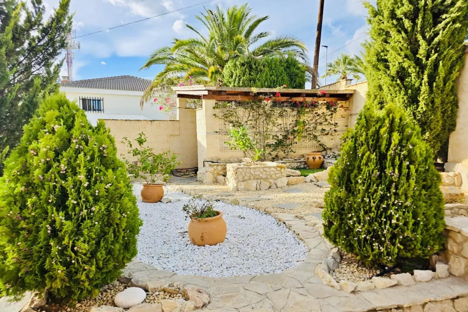 Cozy vacation house-Jardins en été