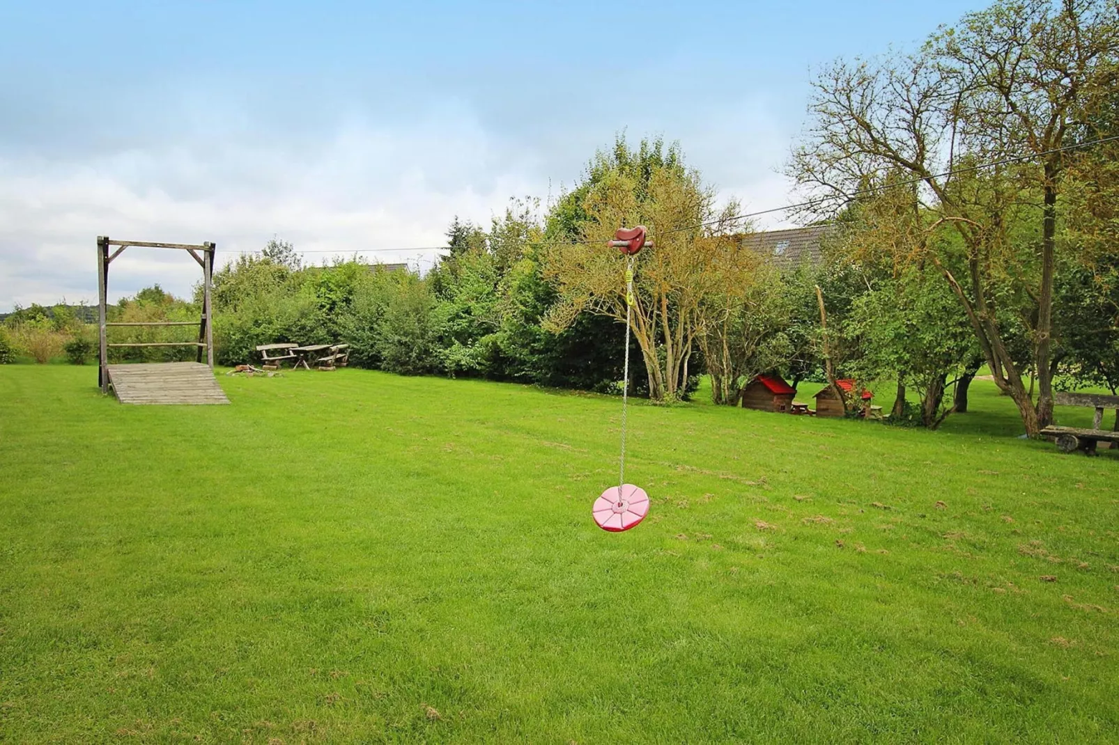 Ferienhaus Gänseblümchen-Garten Sommer