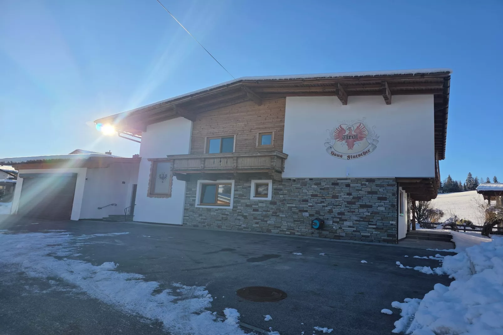 Gästehaus Flatscher-Exterior in winter