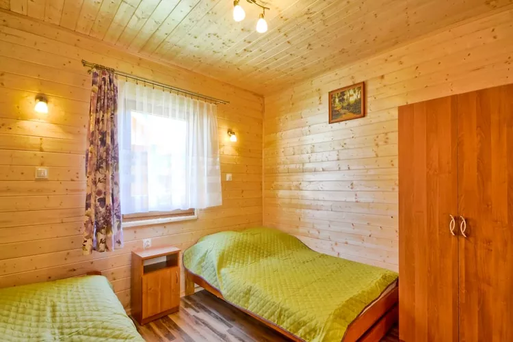 Domki wakacyjne dla max 5 os Karwia-Bedroom