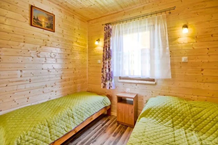 Domki wakacyjne dla max 5 os Karwia-Bedroom