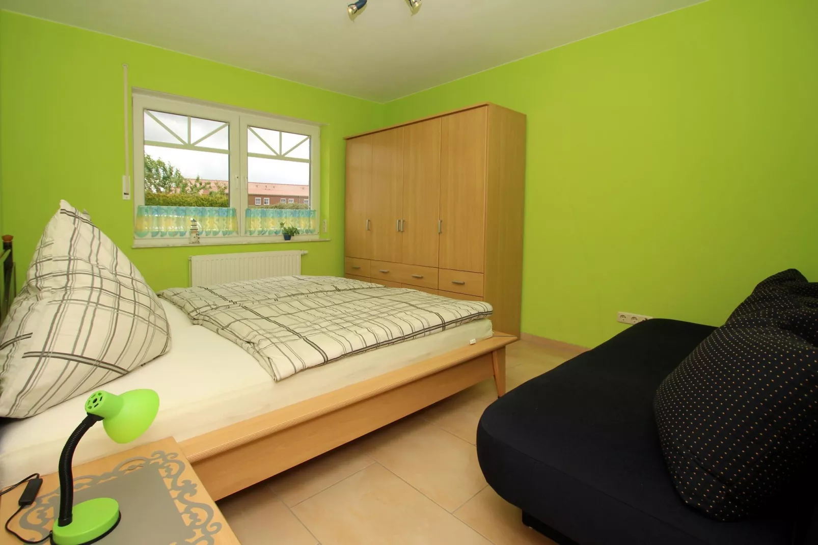 Große Ferienwohnung für 4 Personen mit Terrasse-Bedroom