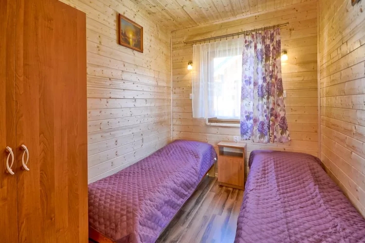 Domki wakacyjne dla max 5 os Karwia-Bedroom