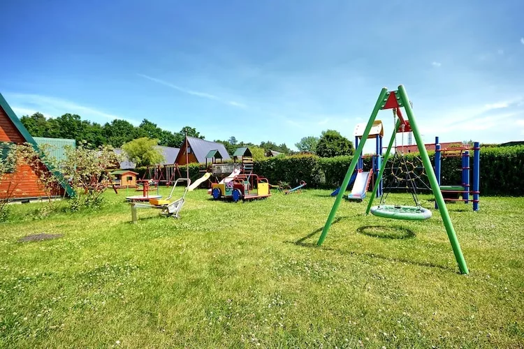 Domki parterowe Karwia-Gardens in summer