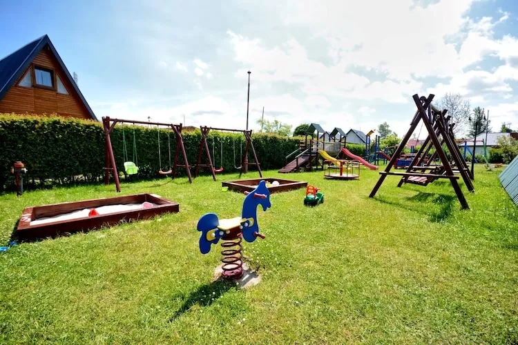 Domki parterowe Karwia-Gardens in summer