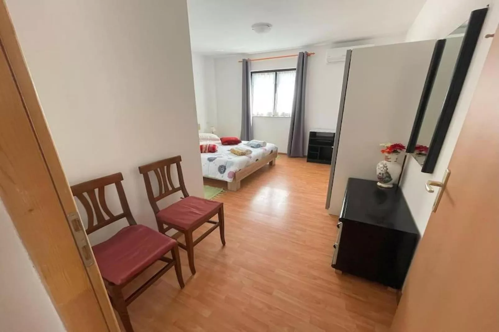 Villa Rosa Apartman-Schlafzimmer