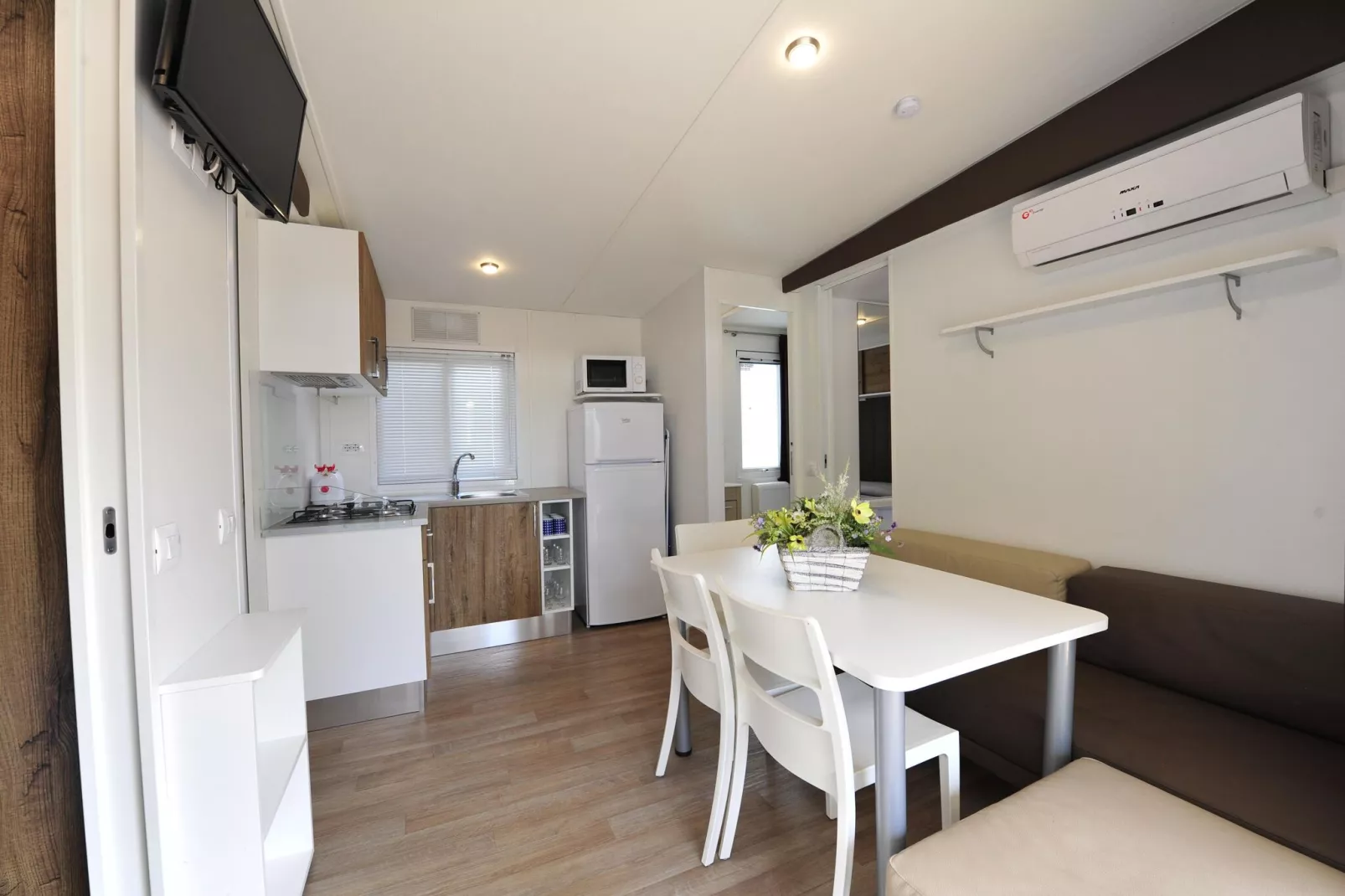 Holiday park Bella Italia, Peschiera-Girasole Suite MH H-Wohnzimmer
