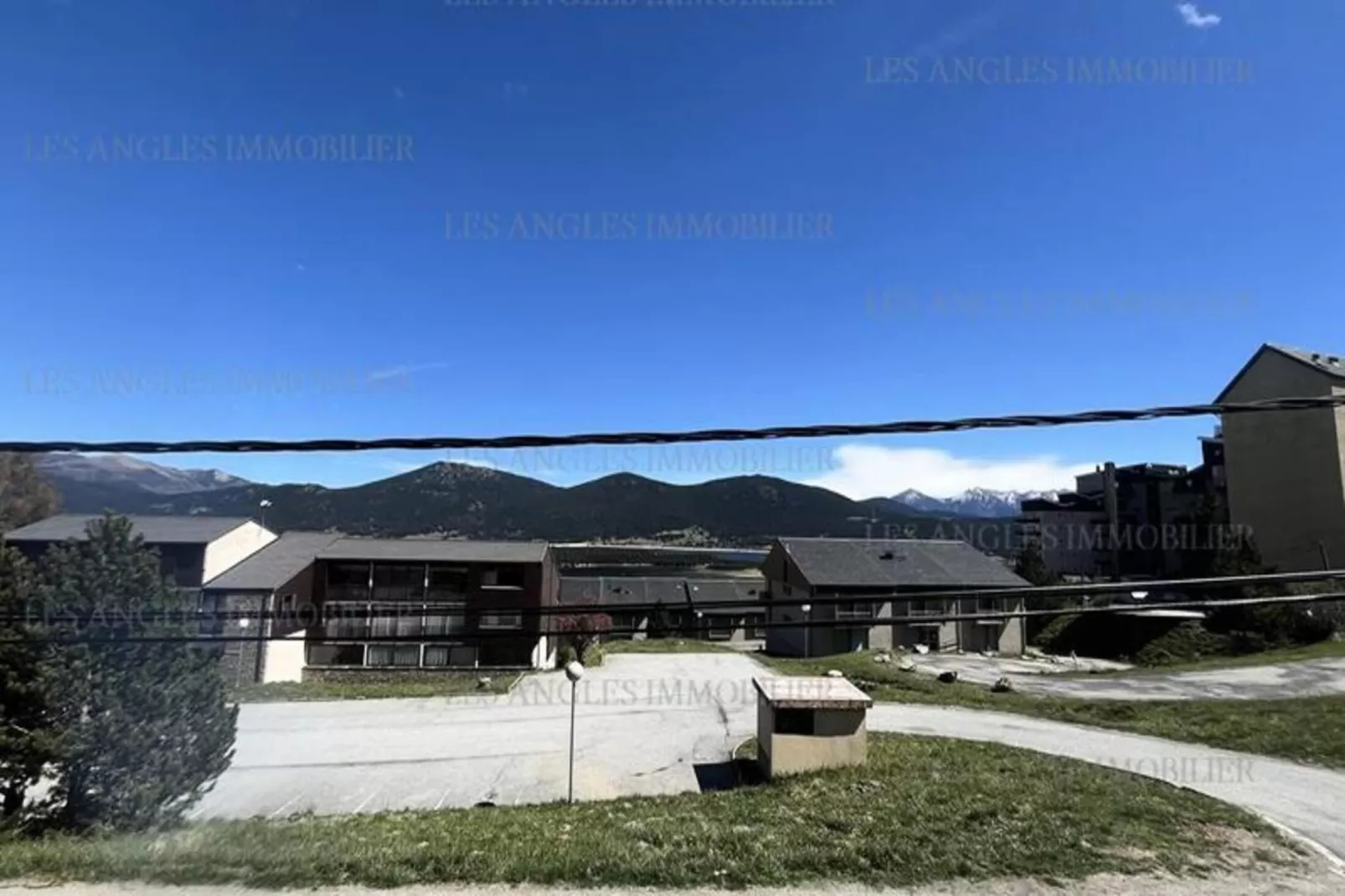 Résidence Les Mouflons-Exterior in summer